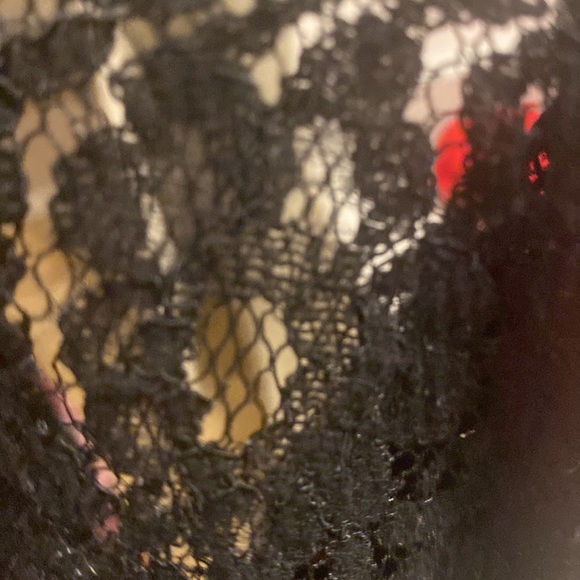 This is a beautiful button down plaid shirt on the back it has black lace - Picture 4 of 4